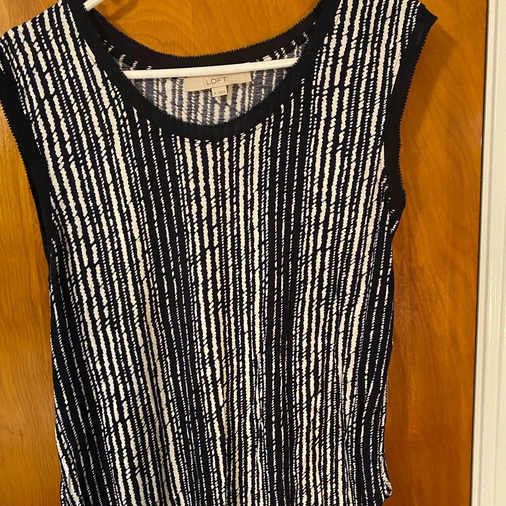 Navy blue and white sleeveless top